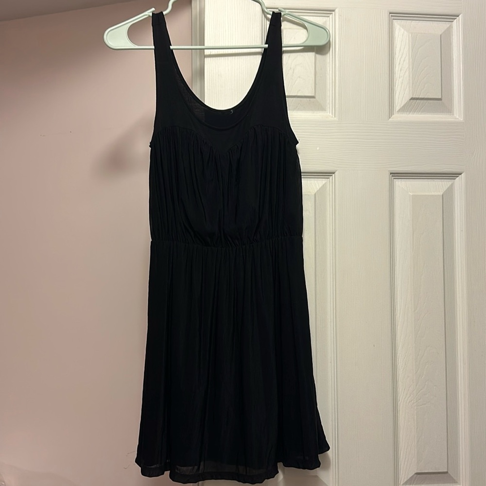 Black lined sleeveless dress